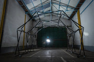 Konligo Arko470 foldable event structure fully assembled indoors under industrial lighting, showing lightweight modular frame design, now available on MTN SHOP US. - imagen 3