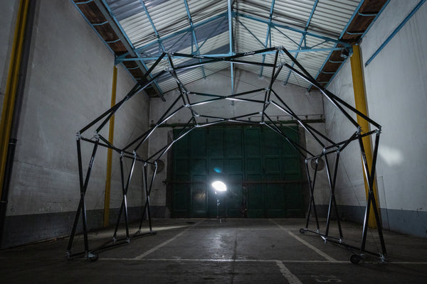 Konligo Arko470 foldable event structure fully assembled indoors under industrial lighting, showing lightweight modular frame design, now available on MTN SHOP US.