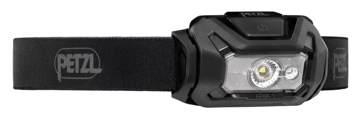 Petzl ARIA 1 RGB Stirnlampe, Schwarz, Nahaufnahme des Lampenkopfs mit Bedienknopf.
