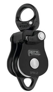 Petzl Spin L2 Umlenkrolle – Doppelte Umlenkrolle mit Wirbel und sehr hohem Wirkungsgrad. Die doppelte Umlenkrolle SPIN L2 lässt sich öffnen, auch wenn sie am Anschlagpunkt befestigt ist, und erleichtert das Einrichten von Flaschenzugsystem und Hilfsseilbahnen. Dank der beiden parallel montierten Laufrollen und der zusätzlichen Befestigungsöse ermöglicht die Umlenkrolle das Einrichten verschiedener komplexer Flaschenzugsysteme. Die großen Laufrollen mit gekapseltem Kugellager gewährleisten einen ausgezeichne - imagen 2