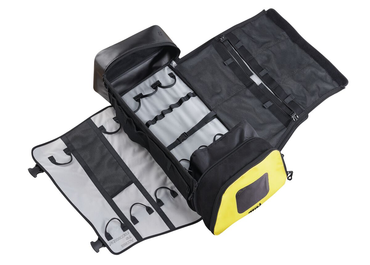Petzl EXPERT 55, vollständig geöffnet und flach ausgelegt mit sichtbaren Taschen und Ausrüstungsschlaufen. - imagen 9